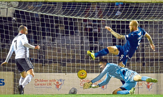 Conor Hazard makes a save during a tie against Ayr in October.