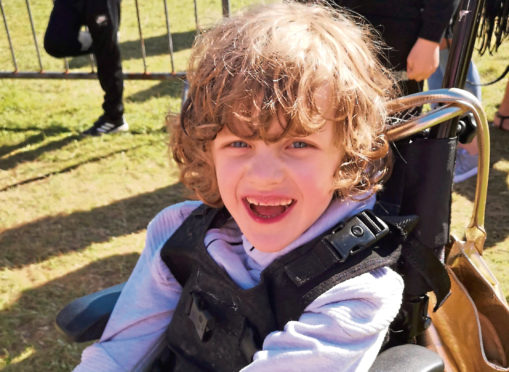 Kade Logan, who had his wheelchair stolen from his home in Invergowrie.