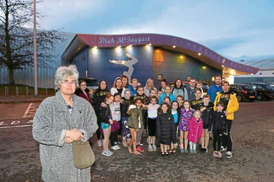The gymnastics group are pictured outside the centre with chair of the club, Clare Huxley.