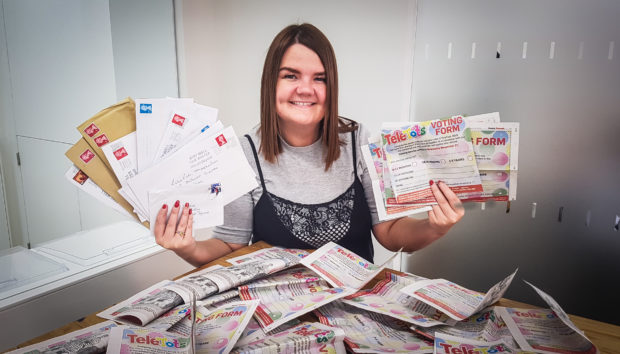 Kristina Stephens, counting the submitted Tele Tots forms for 2019.