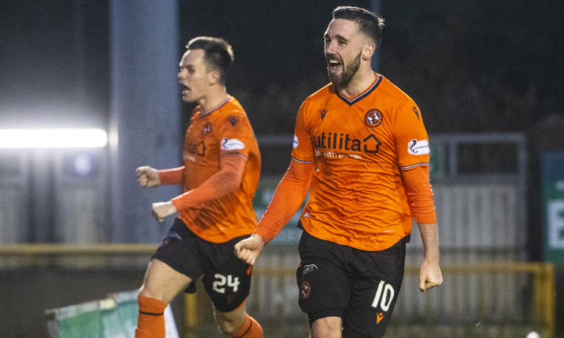 Nicky Clark and Lawrence Shankland celebrate after Clark's goal against Inverness.