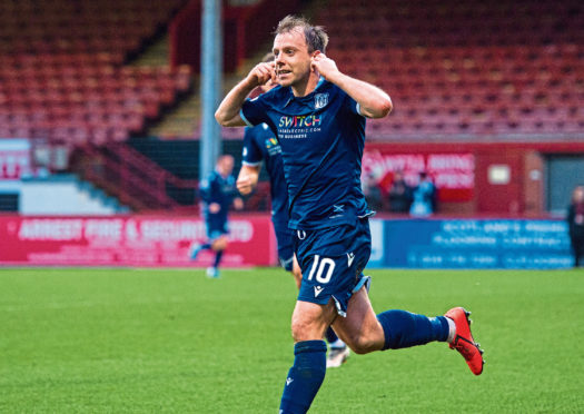 GLASGOW, SCOTLAND - DECEMBER 21: Dundee's Paul McGowan celebrates his goal after scoring to make it 1-0 during a Ladbrokes Championship match between Partick Thistle and Dundee, at Firhill Stadium, on December 21, 2019, in Glasgow, Scotland. (Photo by Sammy Turner / SNS Group)