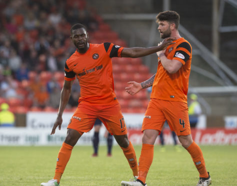 Ex-Dundee United man Wato Kuate clashes with Mark Durnan