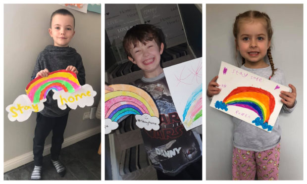 Some of the youngsters with their drawings.