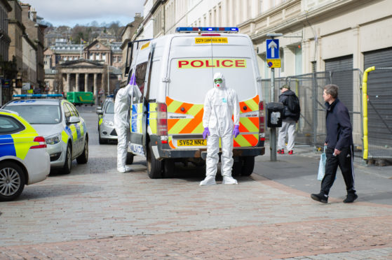 Police in hazmat suits were called to Reform Street. (Picture: DCT Media/Kim Cessford_
