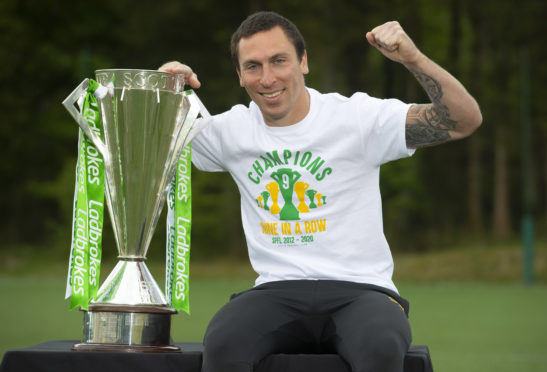 Scott Brown is pictured with the Ladbrokes Premiership trophy as Celtic are announced by the SPFL as title winners for the 2019/2020 season.