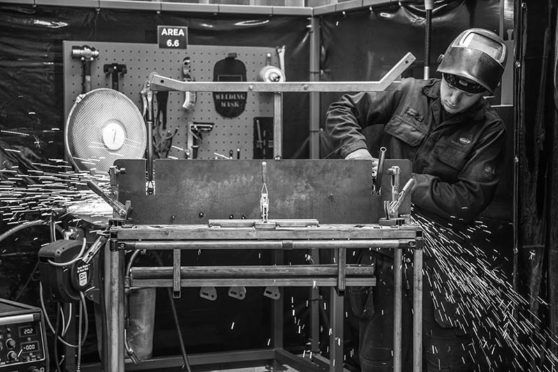 A Seating Matters employee producing medical equipment at the company’s workshop.