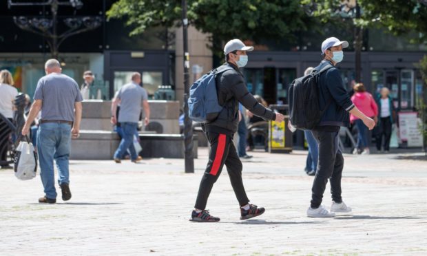 While Dundonians are largely complying with the face mask rules, some shopkeepers claim they have been facing issues.