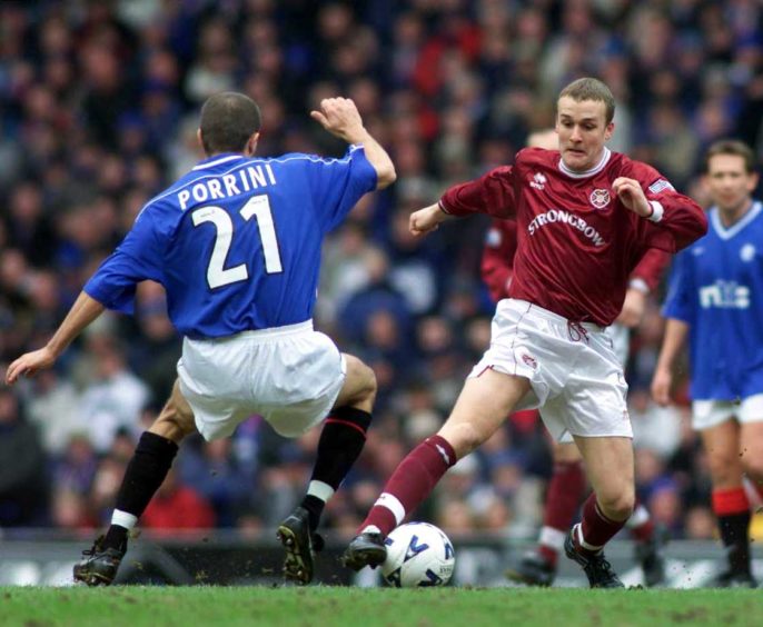 Boyack in action for Hearts against his former club Rangers.