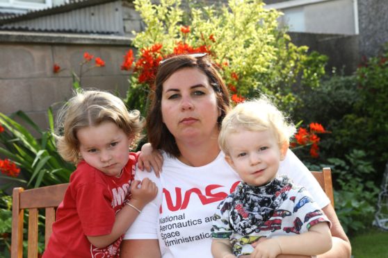 Tele News - Rachel Amery story - TUI Holiday.
CR0022993
Picture shows; Lyndsey Lauder at home in Dundee today, with her kids Maddison, age 3, and Reuben, age 1, who tried to book a holiday with TUI, and then issues meant that they are out of pocket with no holiday booked. Monday 10th August 2020.
Dougie Nicolson / DCT Media.