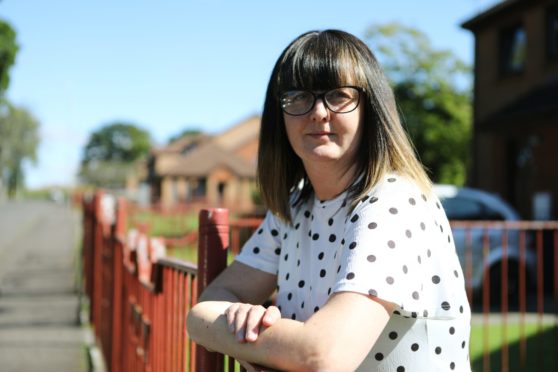 Natalie Sturrock outside her home in Dundee today, where Sanctuary Housing sent someone from Aberdeen to fix her smoke alarm, with no warning, and despite a localised Covid-19 lockdown in the Granite City.