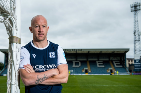New Dundee signing Charlie Adam is unveiled at Dens Park.