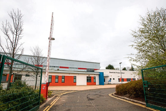 Tele News - Dundee - Lindsey Hamilton Story. Concerns raised about child safety Downfield Primary School due to traffic problems.
Picture shows general exterior of the school with new barriers in place for staff carpark. Downfield Primary School, Haldane Crescent, Dundee. Monday 17th April 2017.