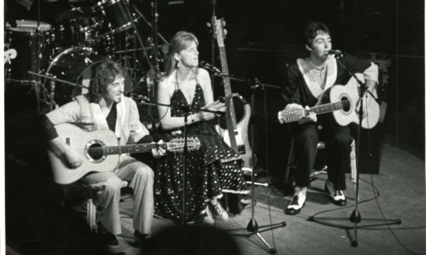Wings perform in Dundee in 1975.
