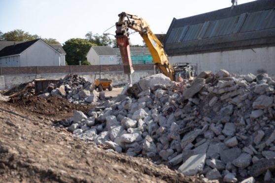 Demolition work has begun on the old Taybank works in Morgan Street, Dundee in preparation for the new housing development.