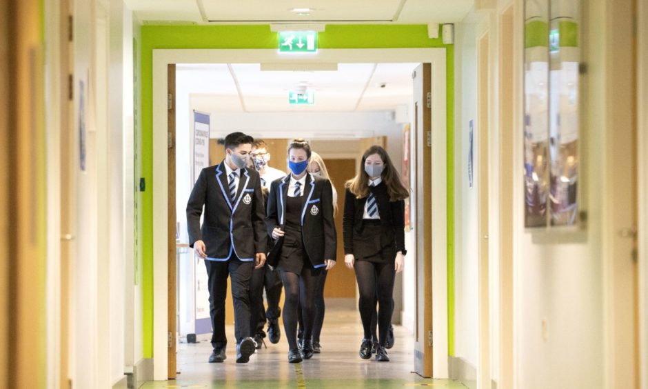 Health boards in Tayside and Fife have reassured parents that there is "no evidence" of coronavirus spreading in schools across the regions.