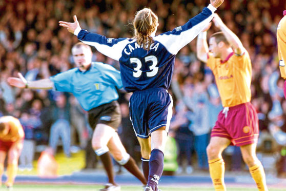Argentinian ace Claudio Caniggia celebrates after netting for Dundee.