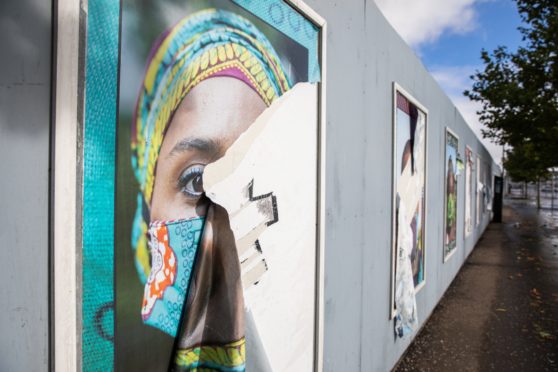 The portraits were torn down over the weekend
