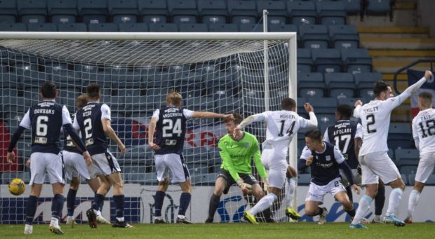 Raith Rovers' Frankie Musonda (No 14) equalises late in the second half to deny Dundee victory.