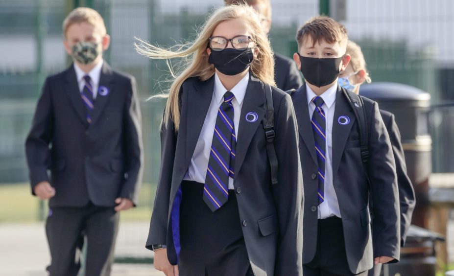 Thousands of pupils missed school on Tuesday because of Covid-19.