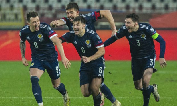 Ryan Jack, Declan Gallagher, Kieran Tierney and captain Andy Robertson celebrate Scotland penalty shootout success in Serbia and Euro 2020 qualification.