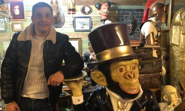 David Tarbett inside his store on the Hilltown.