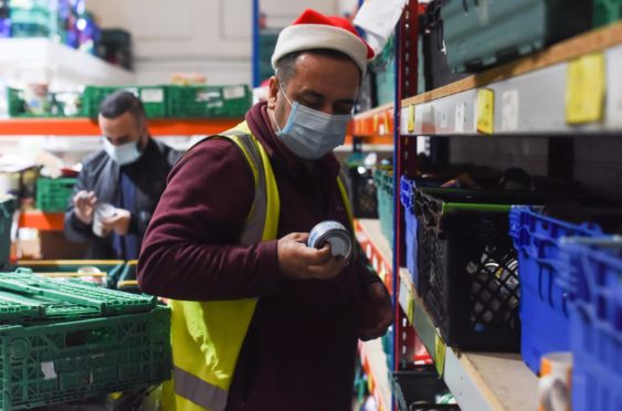 Shoppers in Dundee are being urged to donate to the UK's biggest food collection at Tesco stores.