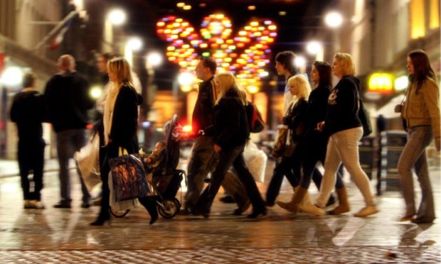 Mad dash! Shoppers leaving it late for Christmas shopping in Dundee city centre in 2007.
