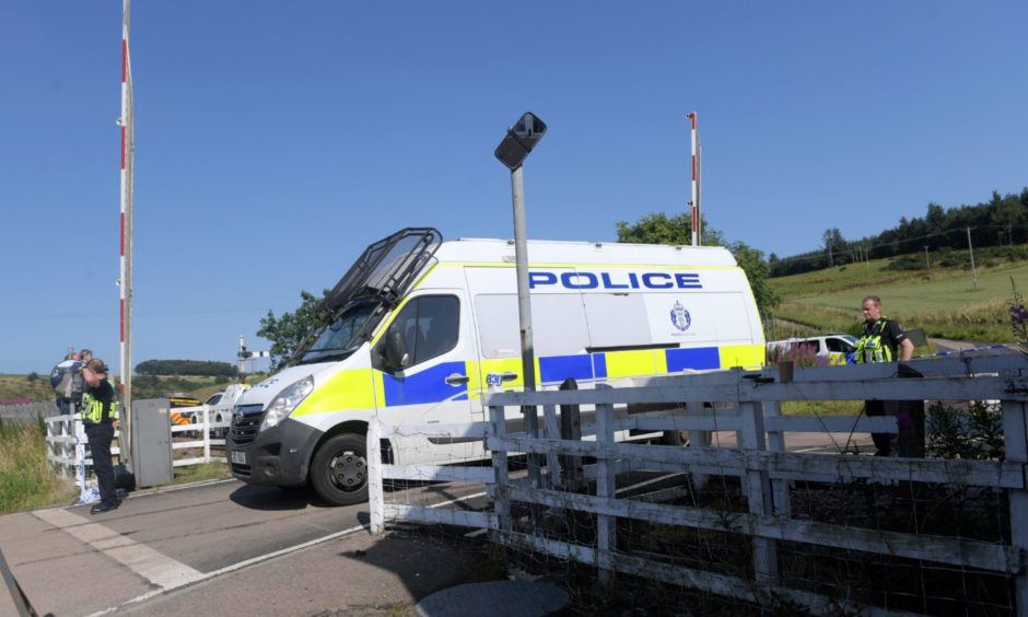 Police teams at Carmont Signal Box on the day of the crash