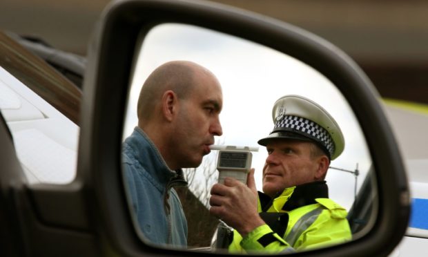 The number of people refusing to take a breathalyser test at the roadside increased in 2020. Pic posed by model.