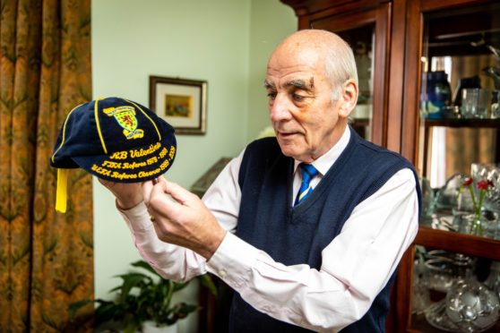 Referee Bob Valentine at home with his memorabilia.