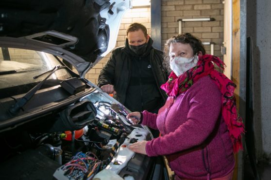 Lochee Community Group need a van as theirs has packed in, putting a stop to their services. Picture shows; l to r - Councillor Alan Ross and Alison Walker - founder of Lochee Community Group
