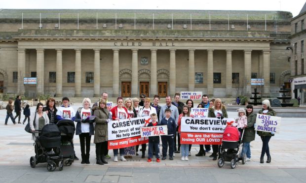 Campaigners previously gathered outside the Caird Hall in Dundee to call for changes to be made to mental health services