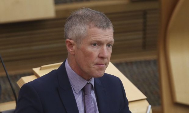 MSPs voted to back a Liberal Democrat led motion to reform the Scottish Qualification Authority and Education Scotland.