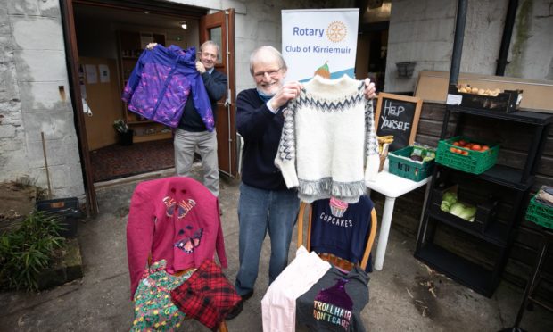 Rotarian Jim Grant (front) and club president Dave Hoskins.
