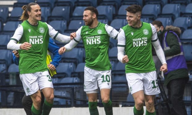 Kevin Nisbet (right) celebrates giving Hibs the lead at Hampden.