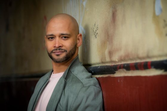 Brian James Leys as Ash King.