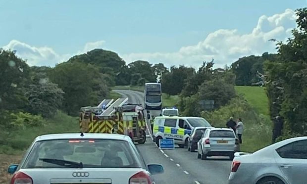 Police closed the road after the two-vehicle collision near Auchtertool