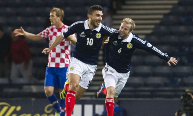 Robert Snodgrass celebrates opening the scoring.