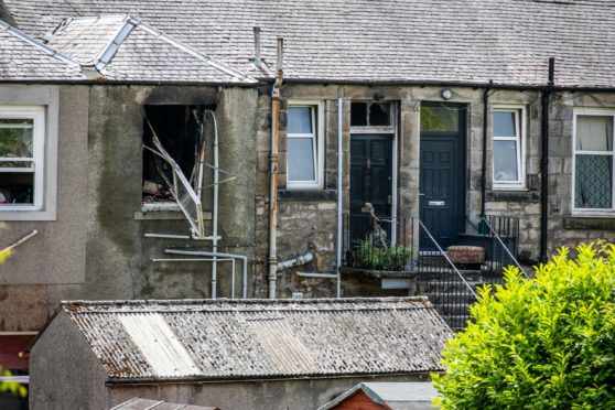 The aftermath of the explosion in Dewar Street.