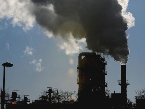 Greenhouse gas emissions are warming up the world – but people may be learning how to live with higher temperatures, research suggests (Owen Humphreys/PA)