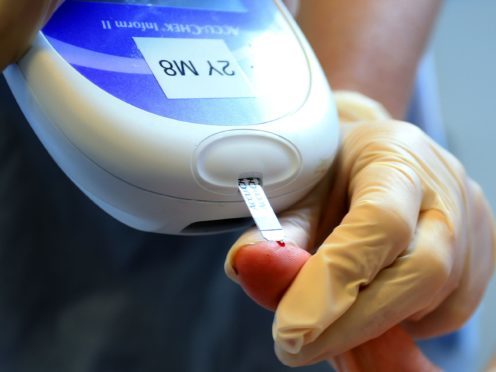 A patient undergoing a diabetes test (Peter Byrne/PA)