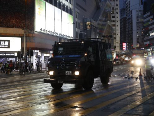 A police armoured vehicle in Hong Kong (Vincent Thian/AP)