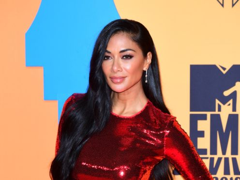 Girl group The Pussycat Dolls are reuniting nine years after their acrimonious break-up, singer Nicole Scherzinger has confirmed (Ian West/PA)