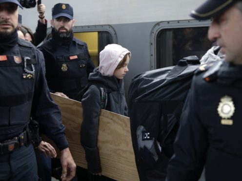 Climate activist Greta Thunberg arrives in Madrid (Andrea Comas/AP)