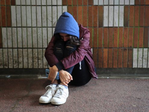 A teenage girl showing signs of mental health issues (Gareth Fuller/PA)