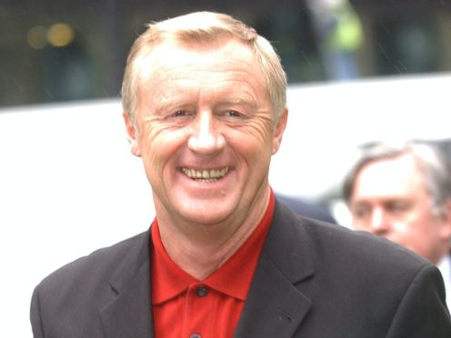 Chris Tarrant arrives at Southwark Crown Court for the trial in 2003 (Stefan Rousseau/PA)