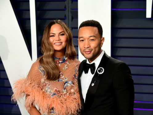 Chrissy Teigen and John Legend cheered Joe Biden’s running mate (Ian West/PA)