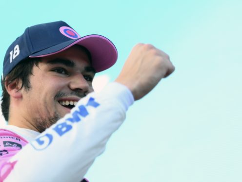 Racing Point driver Lance Stroll of Canada celebrates his pole position (Clive Mason/Pool via AP)