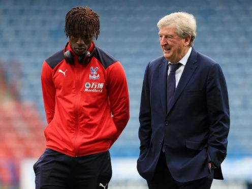 Roy Hodgson is pleased Crystal Palace will have Wilfried Zaha back for the trip to West Brom (Mike Egerton/PA)